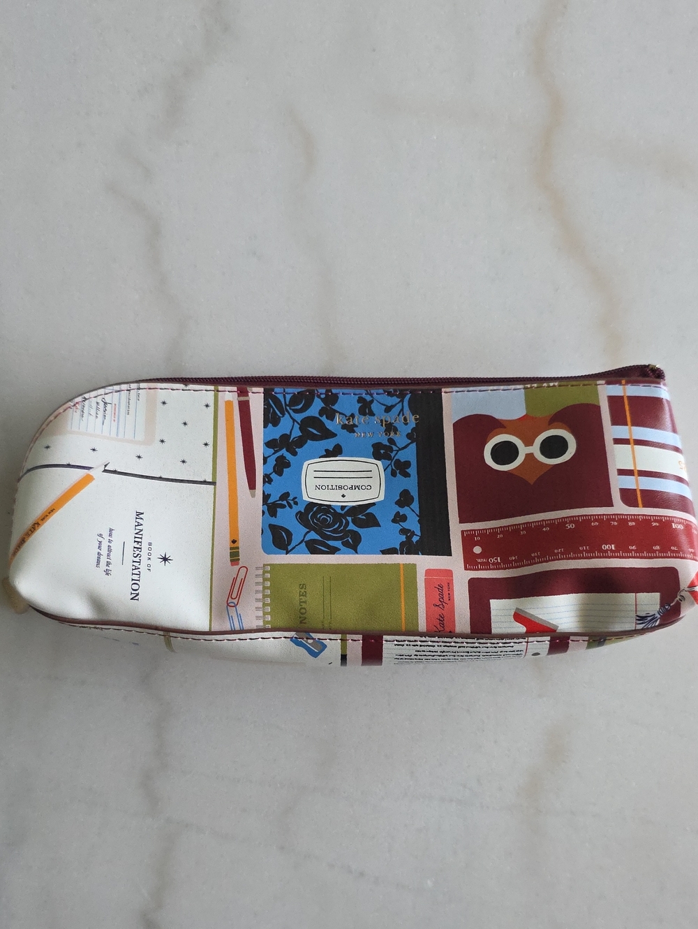 kate spade multicolor printed pencil case in cream, blue, green and burgundy